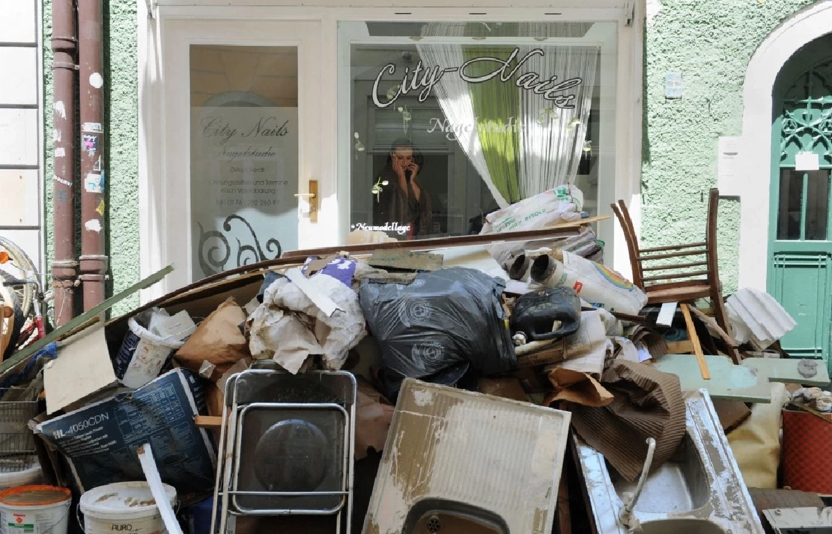 ฟื้นตัวหลังน้ำท่วม บทเรียนจากต่างประเทศ : ทำอย่างไรให้ไม่ต้องเริ่มนับหนึ่งทุกปี Credit ภาพ AFP