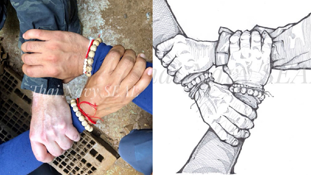 เฉลยที่มาภาพ "มือประสานมือ" บ่งบอกพลัง เฉลยที่มาภาพ "มือประสานมือ" บ่งบอกพลัง